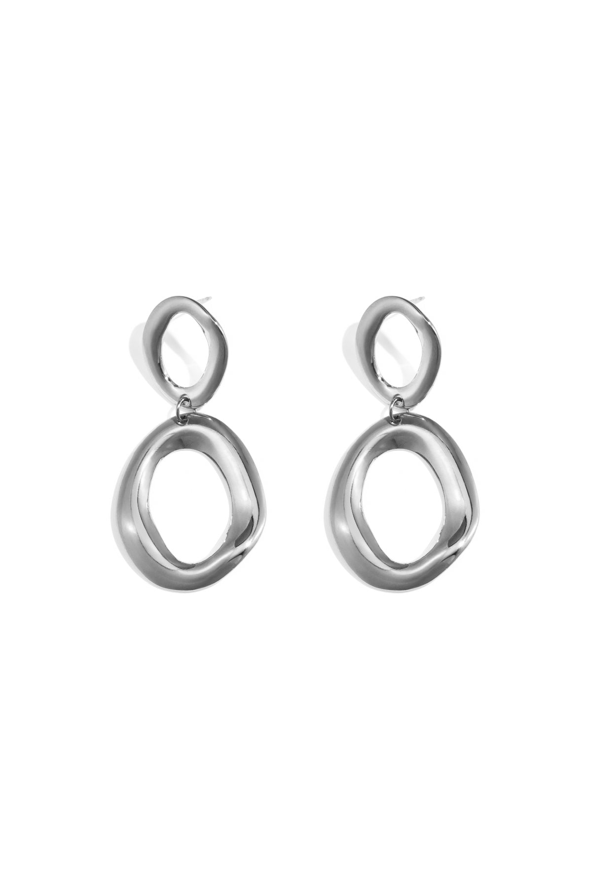 Boucles d'oreilles imposantes avec anneaux organiques