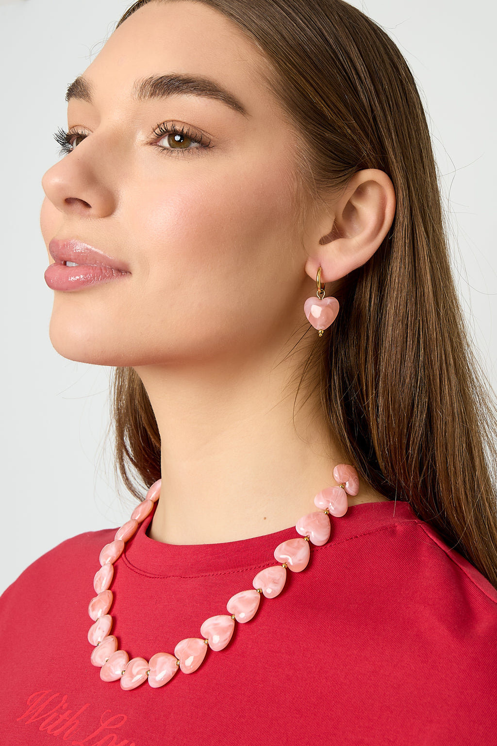 Boucles d'oreilles avec des perles en forme de cœur