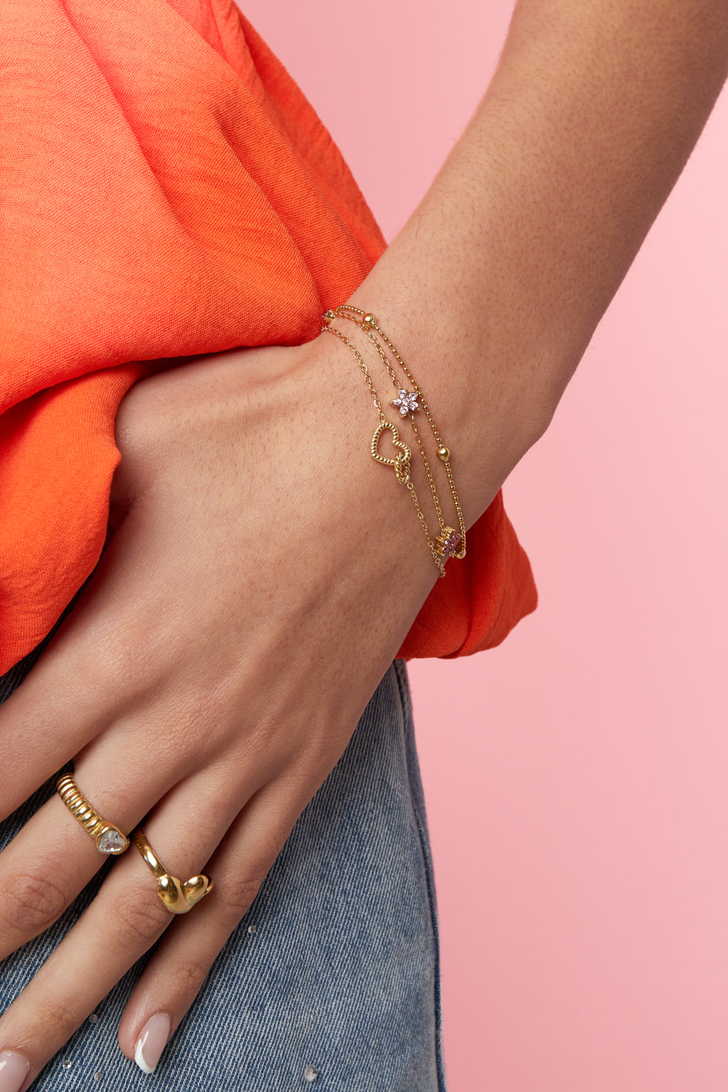 Bracelet avec breloque cœur reliée