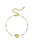 Bracelet orné de perles, de pierres et d'un cœur imposant
