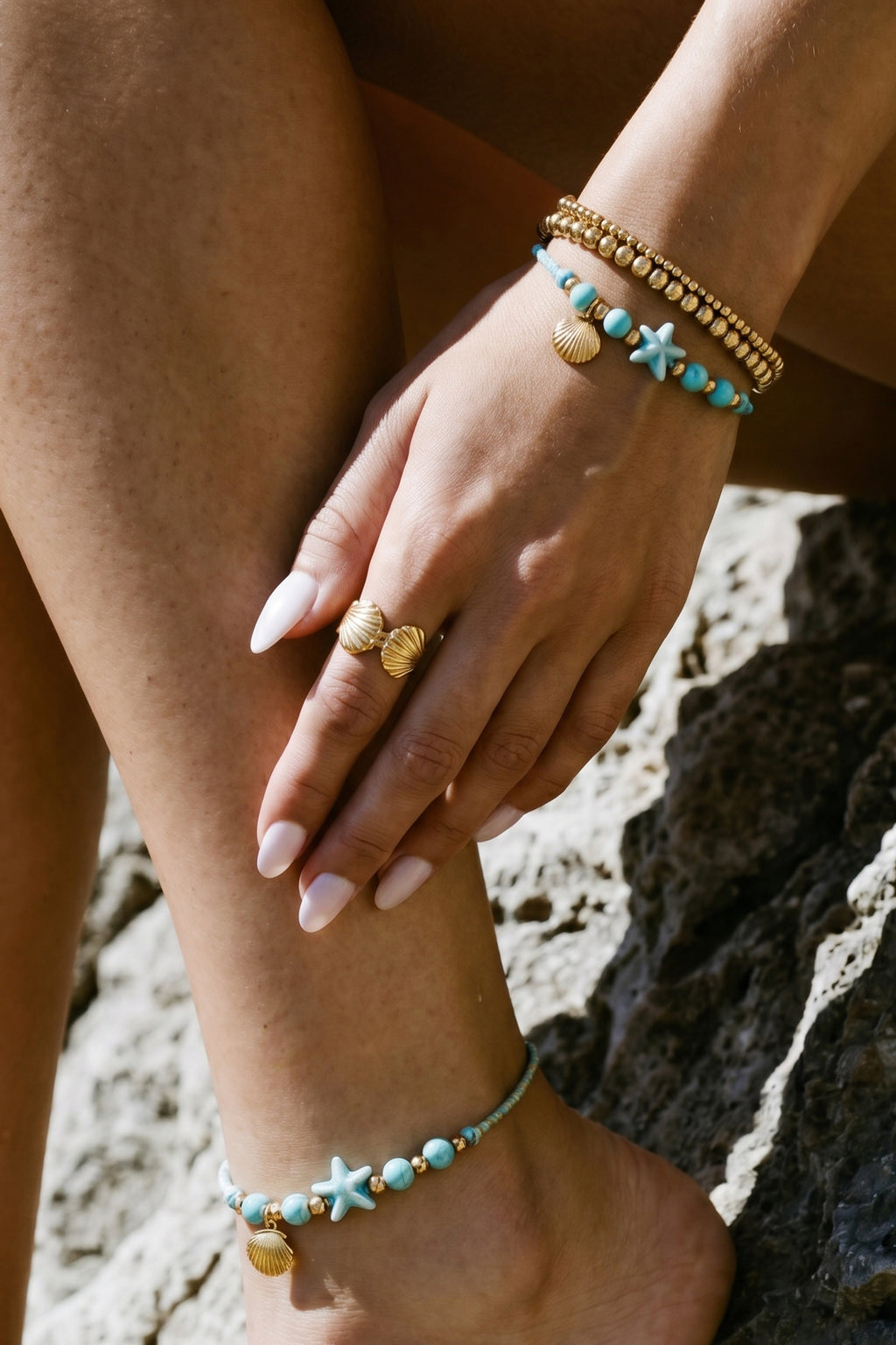 Bracelet orné de perles à motif de corde, d'étoiles de mer et de coquillages