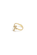 Bague imposante ornée d'une croix et de pierres