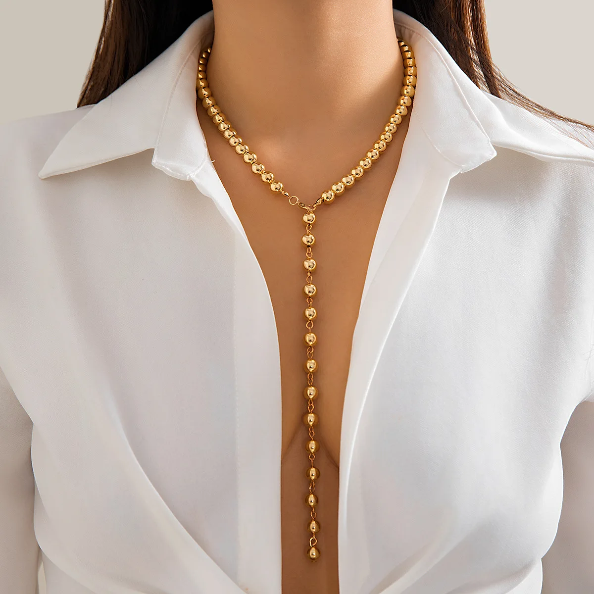 Collier ras du cou à perles