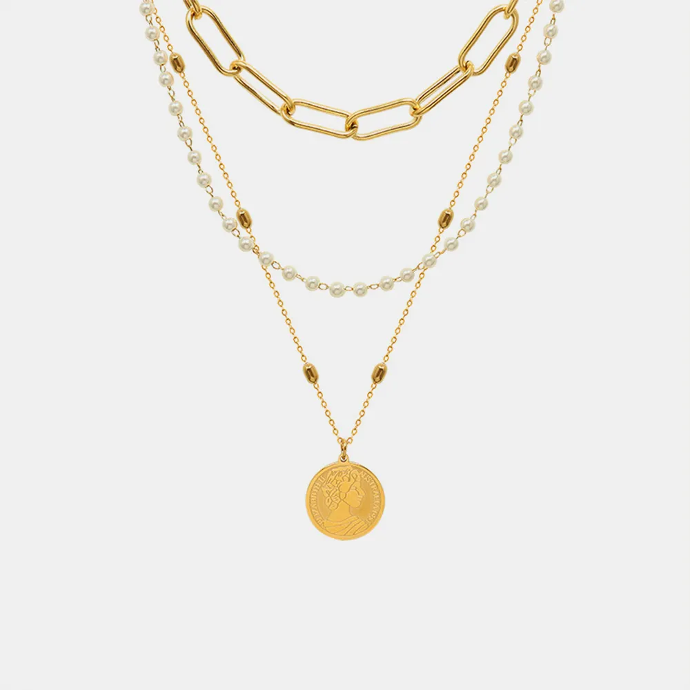 Collier à 3 rangs en acier titane et perles synthétiques