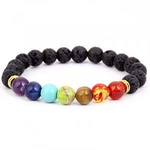 Bracelet en alliage et pierres volcaniques, orné de perles.